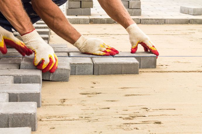 Construction Workers Installing Bricks — Susanville, CA — Sezzi Concrete & Materials, Inc.