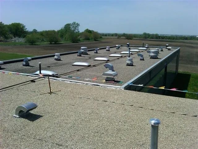 A roof with a lot of vents on it