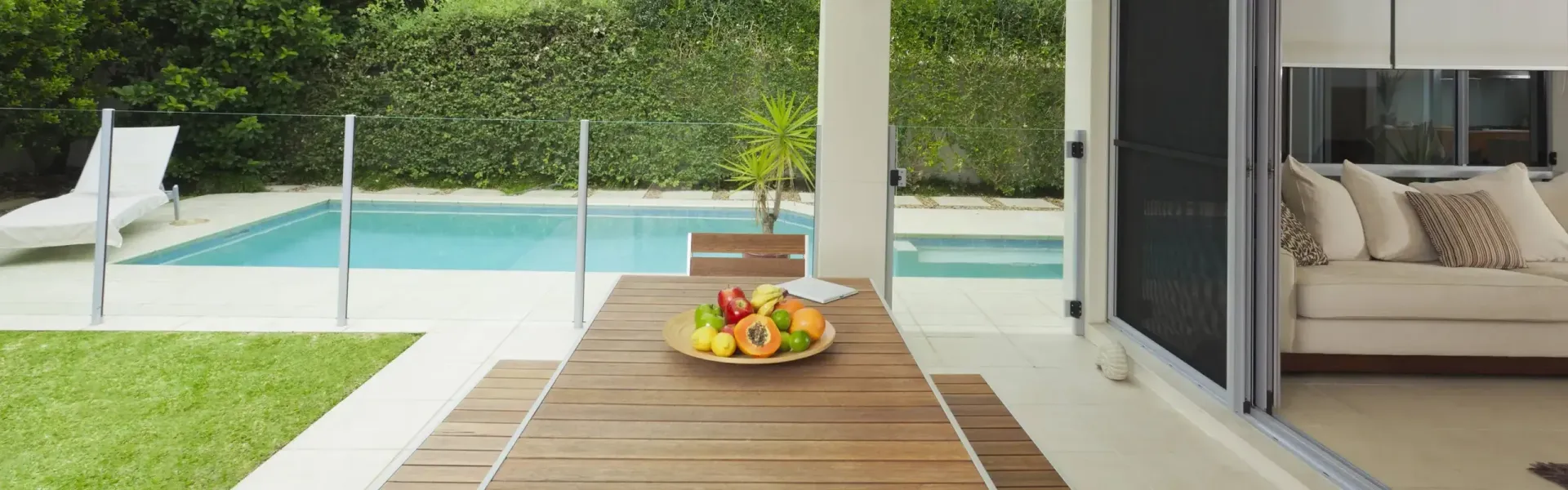 Modern Patio With Wooden Table — KLS Fencing In Cooktown, QLD