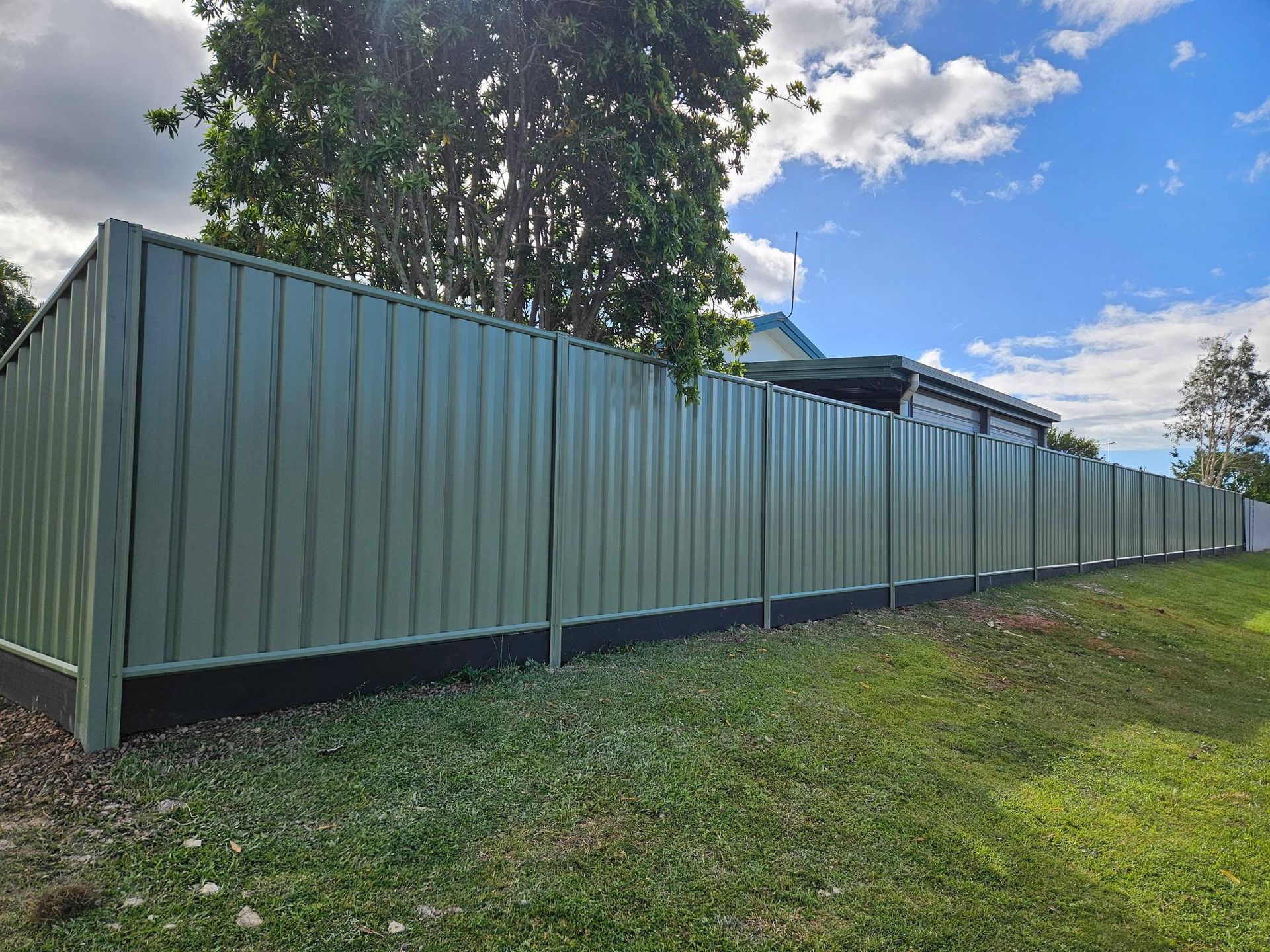 Long Corrugated Metal Fence — KLS Fencing In Innisfail, QLD