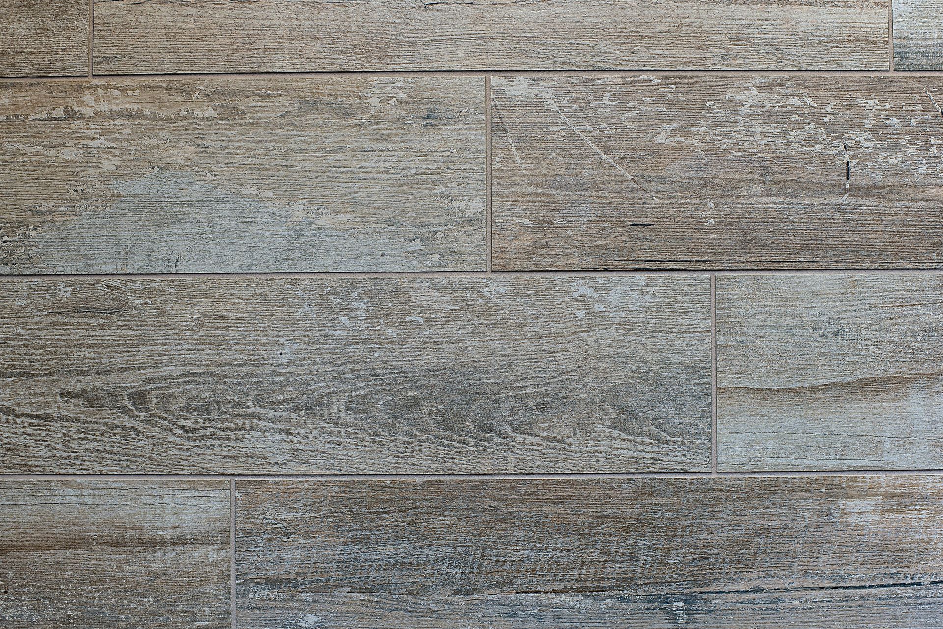 Gray and brown rectangular tiles arranged horizontally.