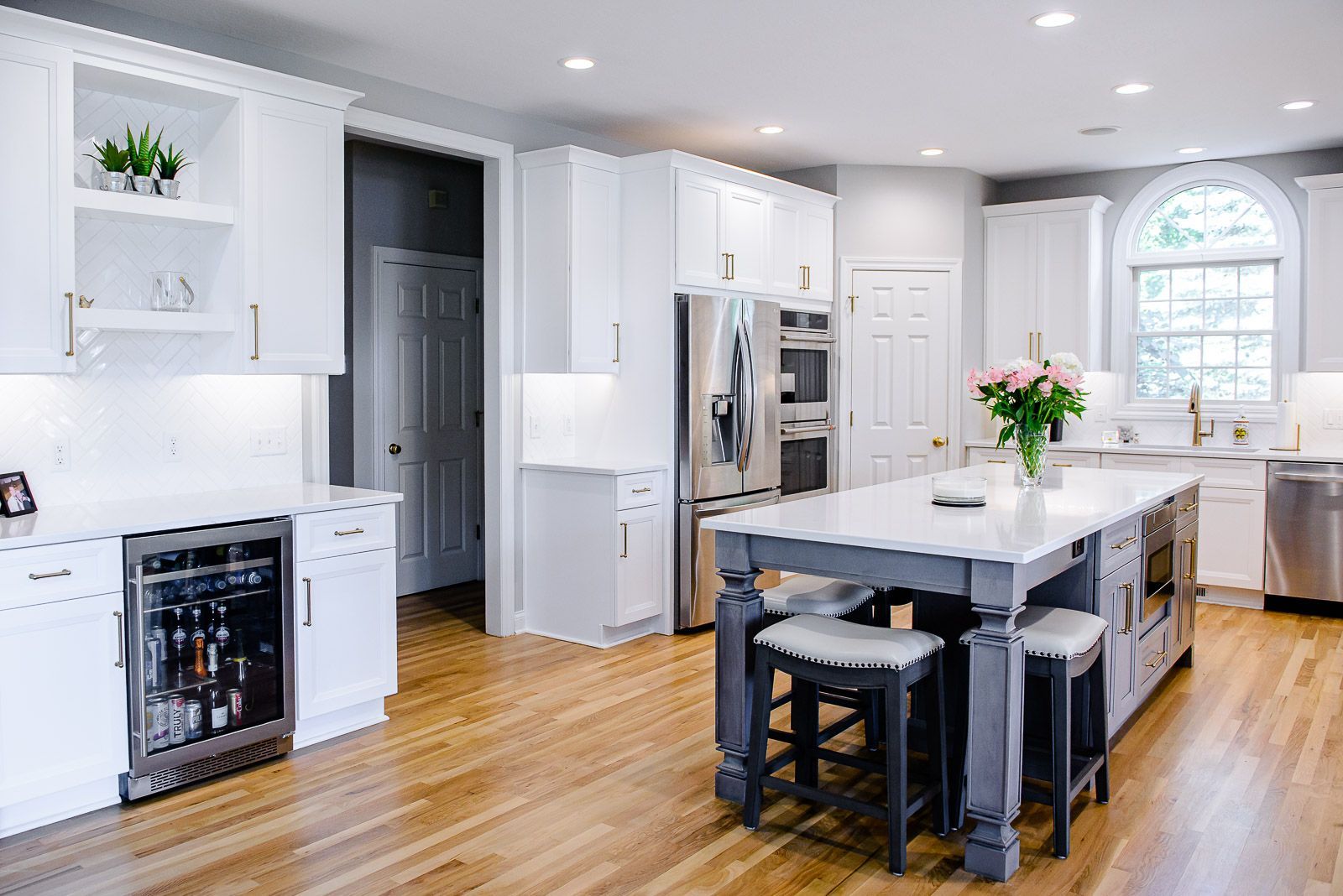 There is a large island in the middle of the kitchen.