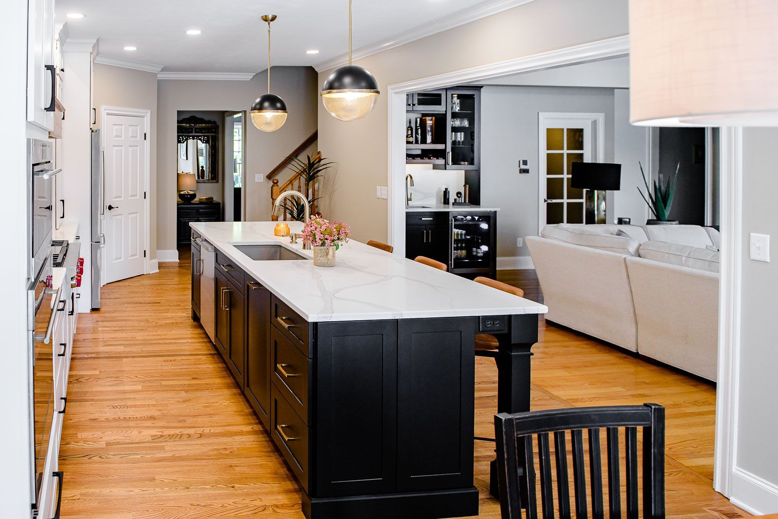 There is a large island in the middle of the kitchen.