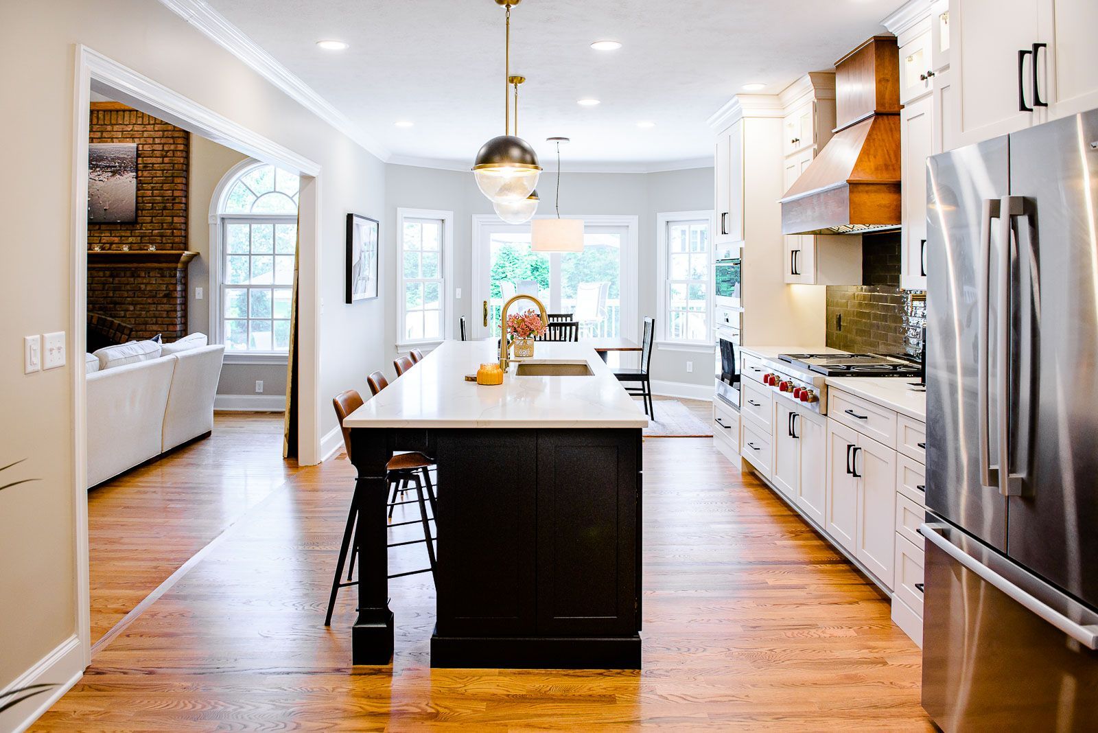 There is a large island in the middle of the kitchen.