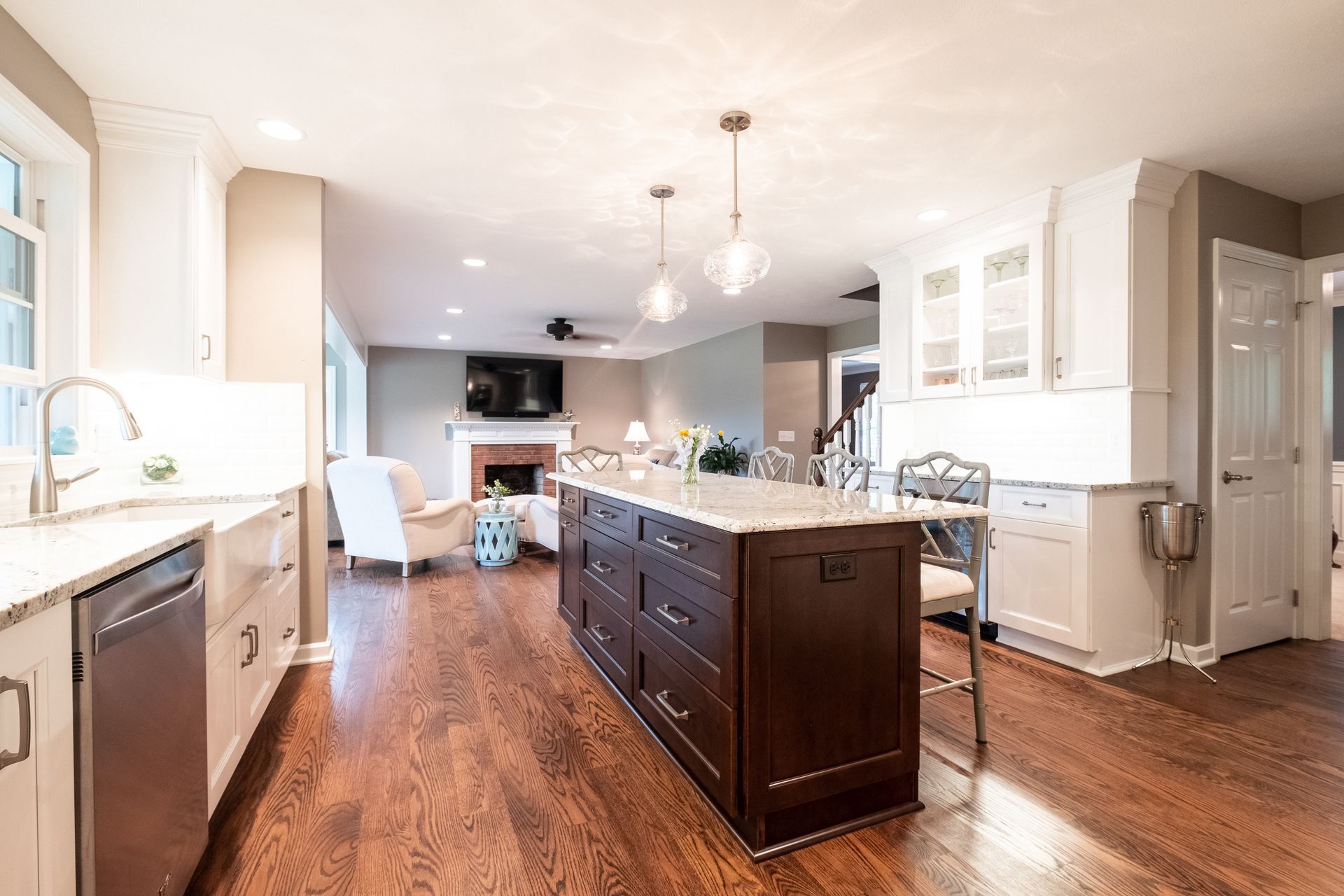 A kitchen with a large island in the middle of the room.
