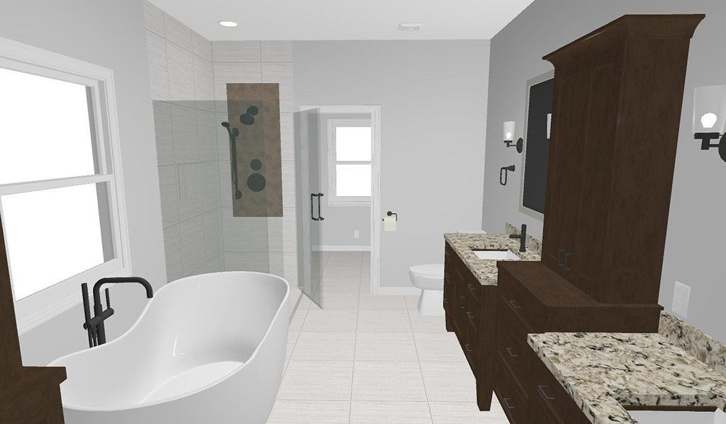 A bathroom with a bathtub , sink , toilet and shower.