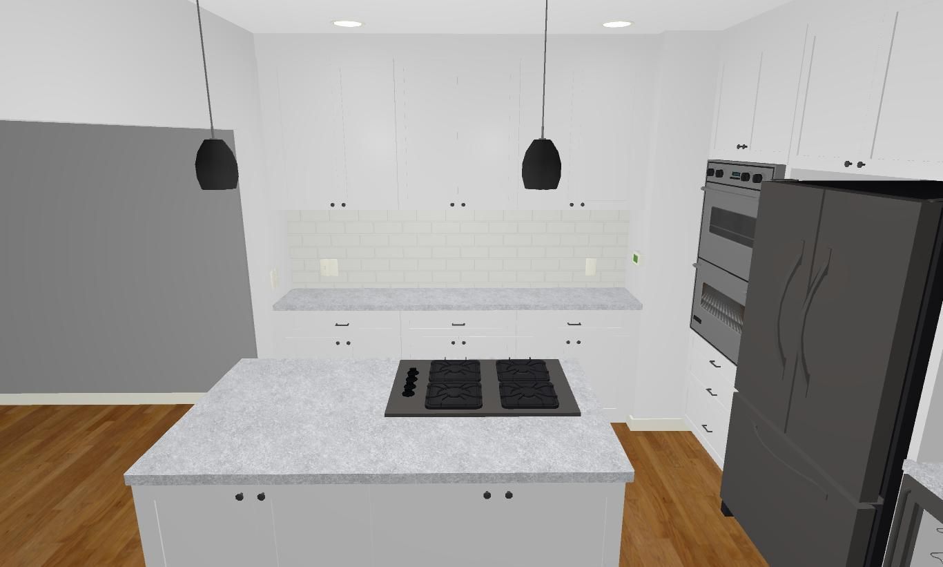 A kitchen with white cabinets and a black refrigerator.