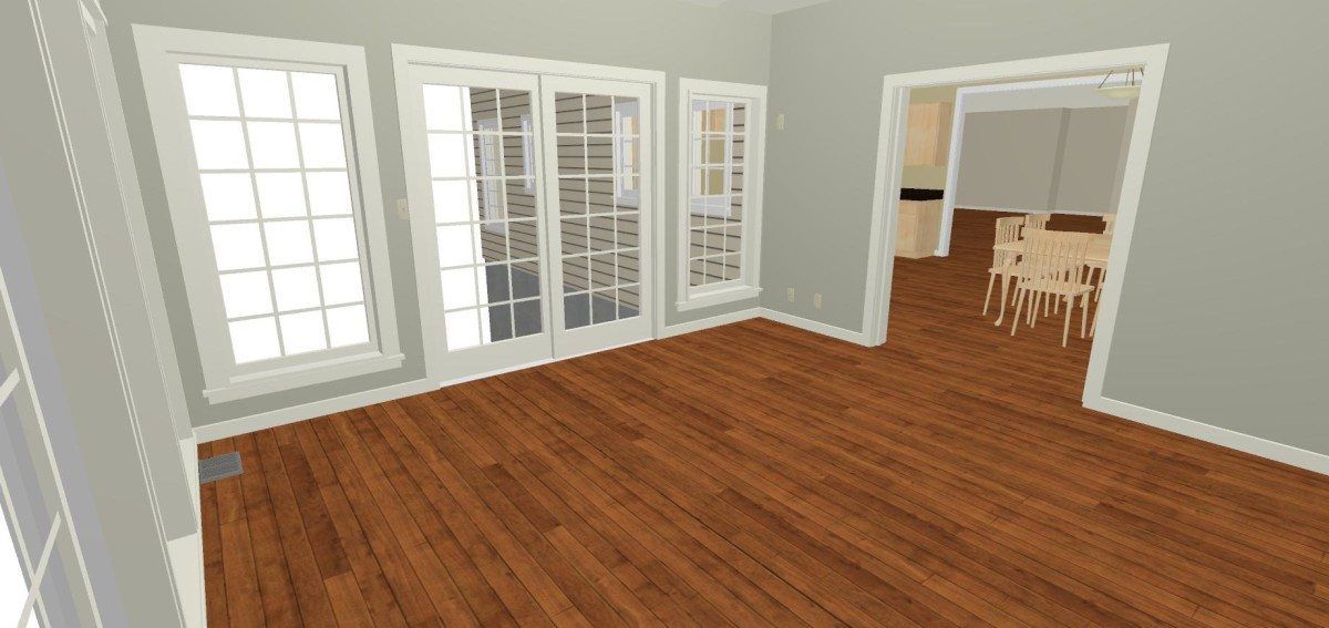 An empty room with hardwood floors and french doors.