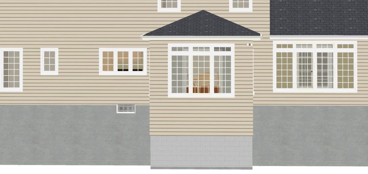 A house with a lot of windows and a black roof