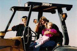 Rock and Material Delivery — Family in Tractor in Tolleson, AZ