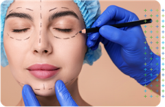 a woman is getting a plastic surgery on her face .