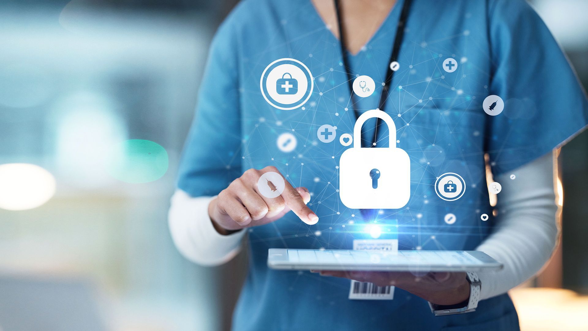A nurse is holding a tablet with a padlock on it.