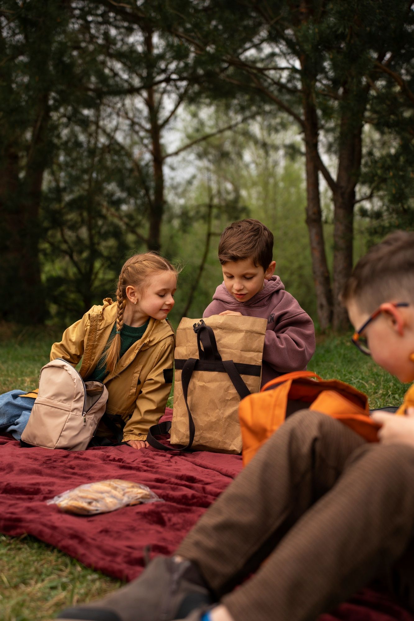 An RBT and a child are playing with blocks on the floor during an in-home aba therapy session
