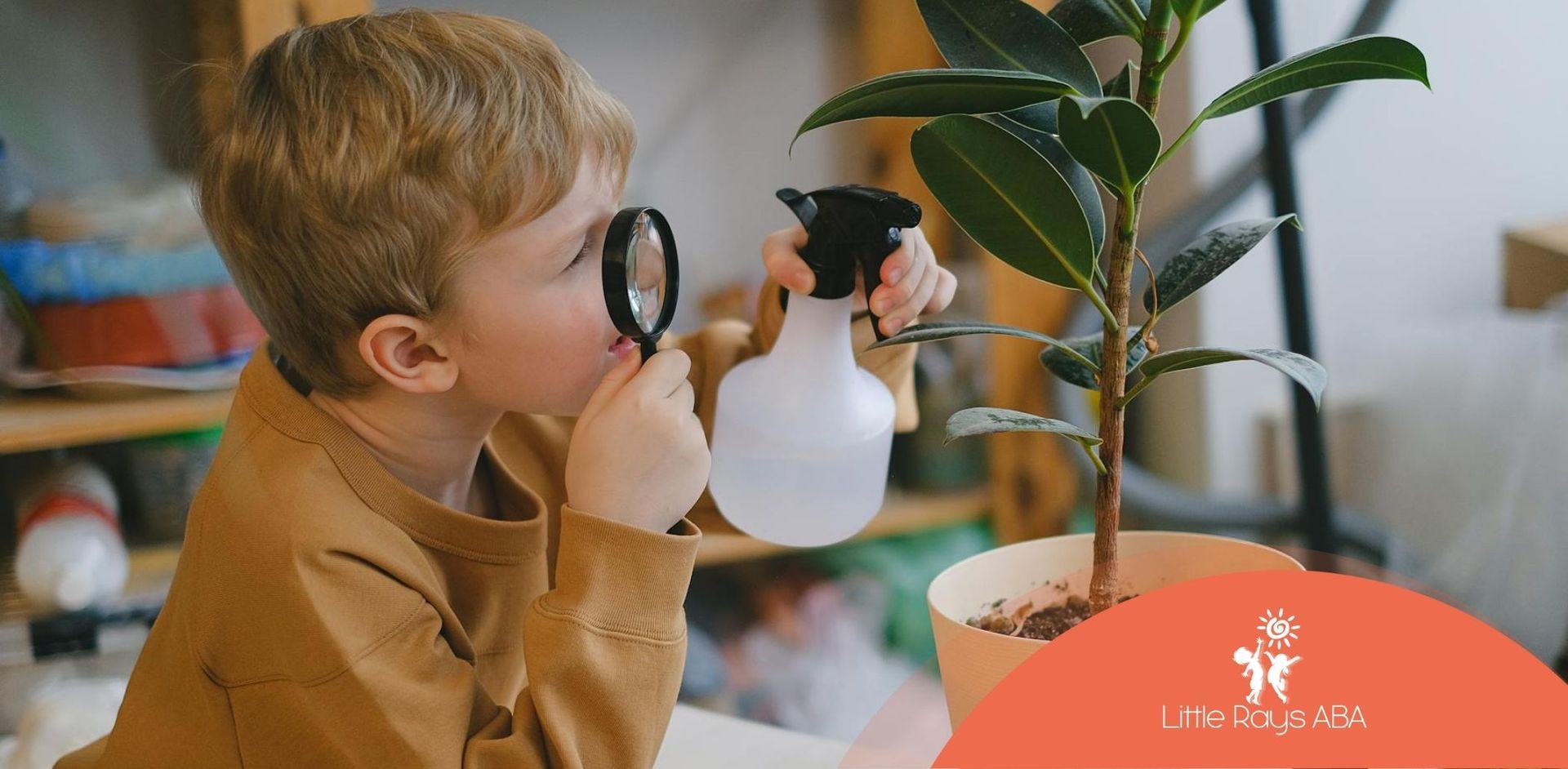 Autistic child examining houseplant using a magnifying glass during ABA therapy session in Florida.