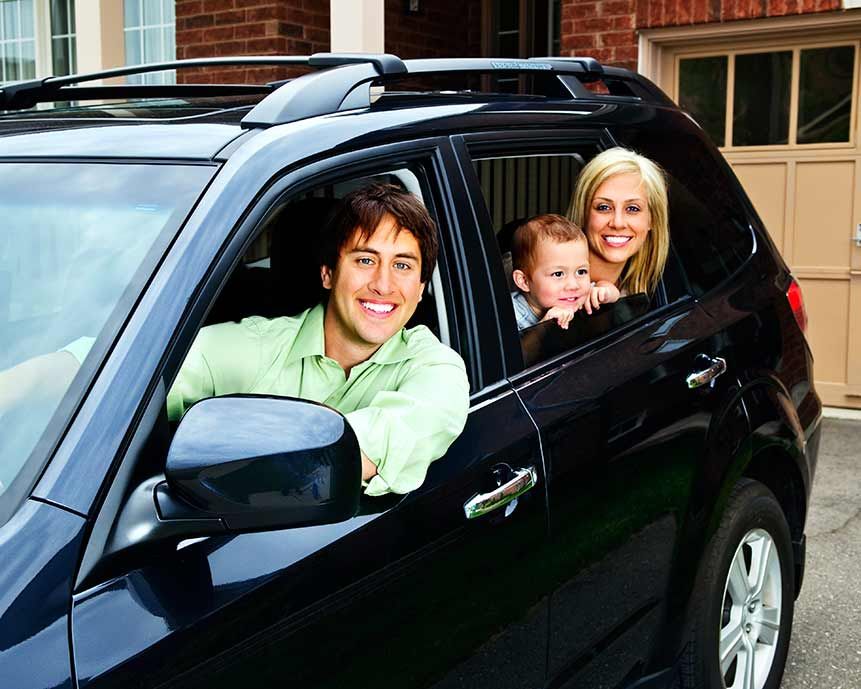 A Family Is Sitting In A Black Suv And Smiling - San Pablo, CA - Grand Prix Car Wash San Pablo