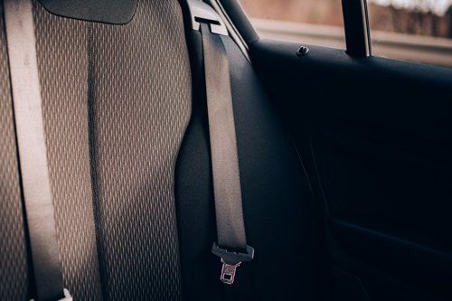 A Close Up Of A Car Seat Belt In The Back Seat Of A Car - San Pablo, CA - Grand Prix Car Wash San Pablo