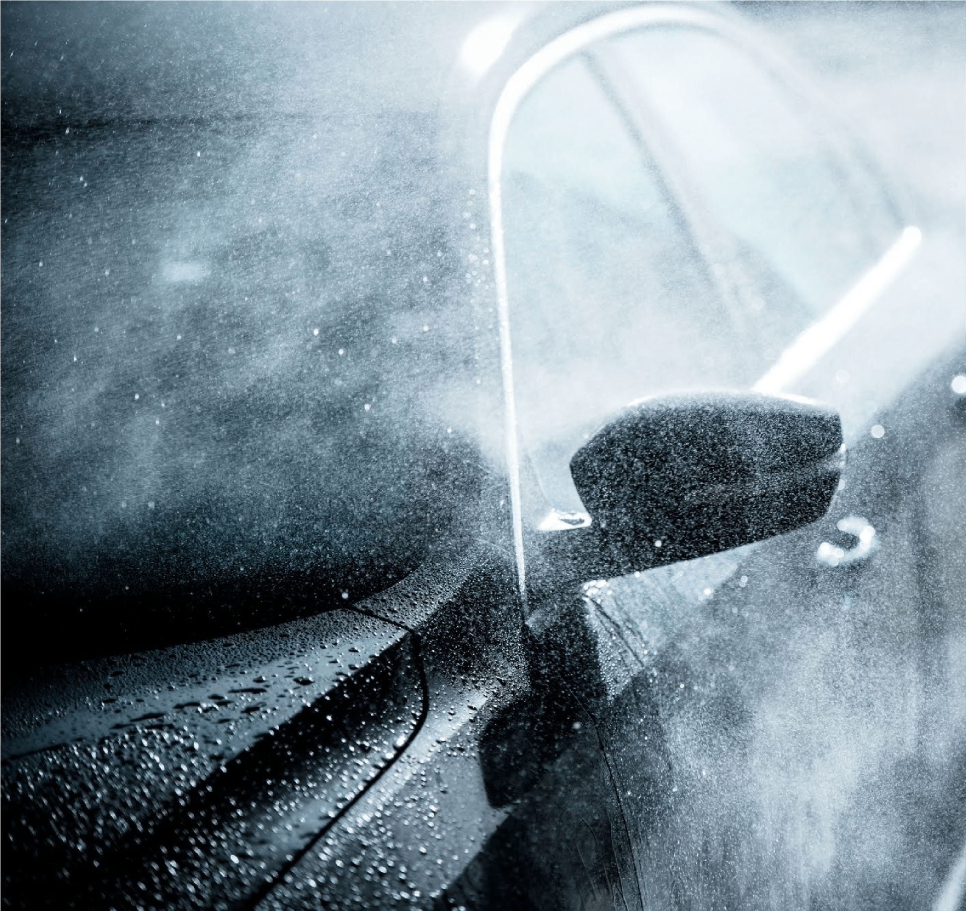 A Car Is Being Sprayed With Water In The Rain - San Pablo, CA - Grand Prix Car Wash San Pablo