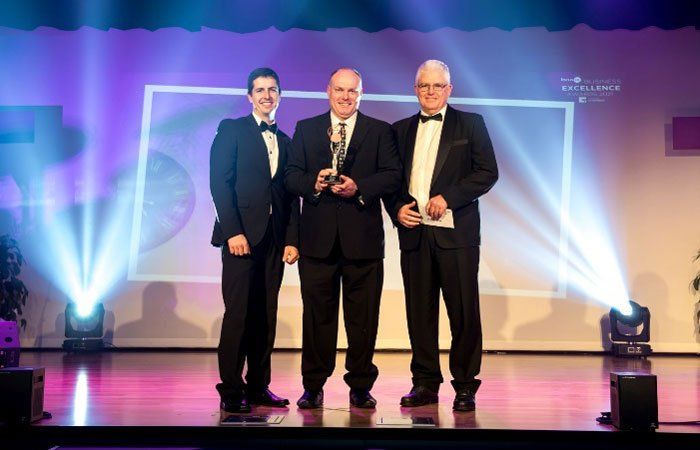 Stewart Eddie with Business Award