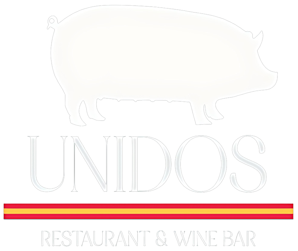 Logo for Unidos Restaurant & Wine Bar featuring a pig silhouette, the word UNIDOS, and a Spanish flag.