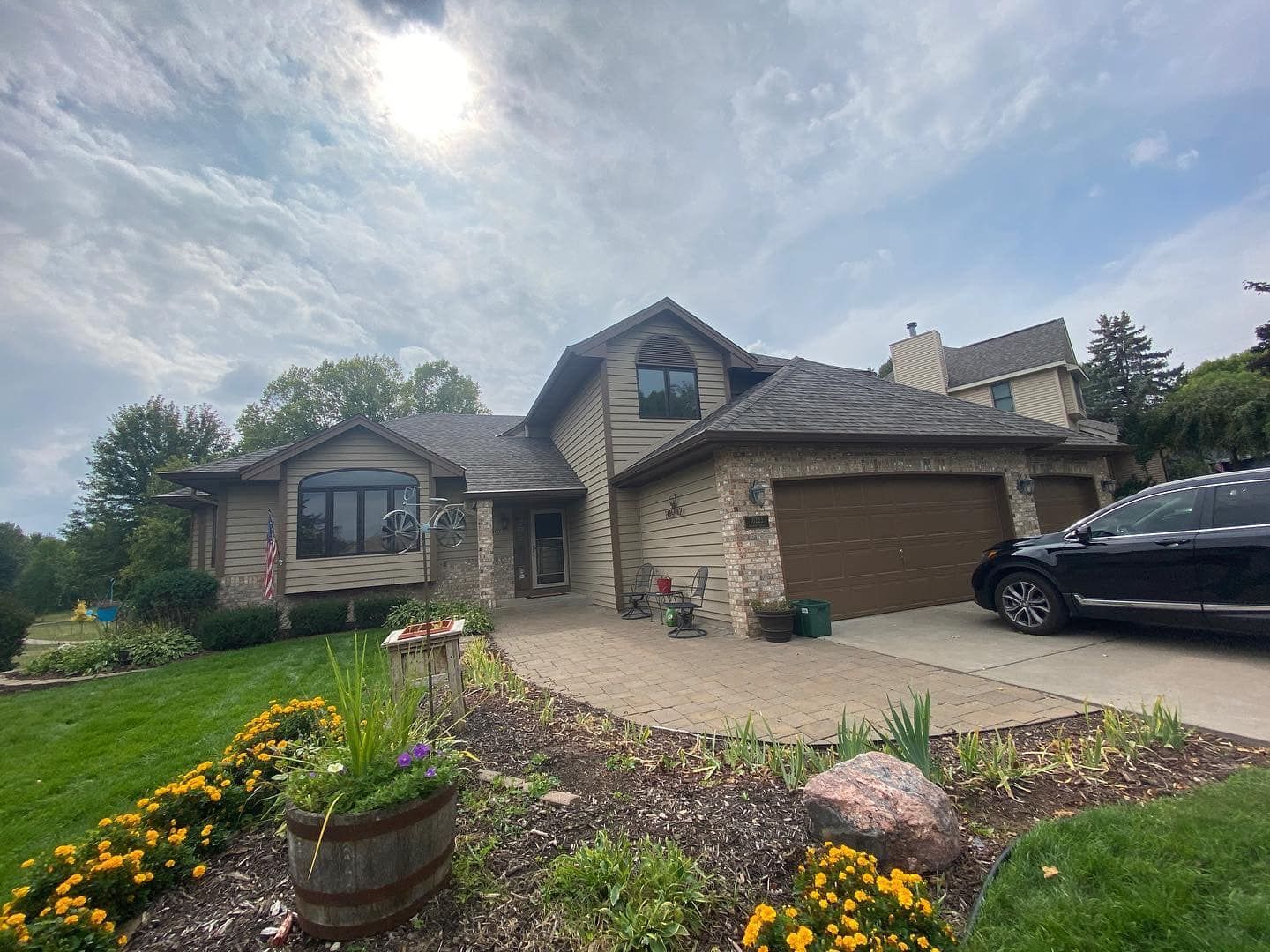 Simple House with Beautiful Garden and Flowers  | Maple Grove, MN | Pure Construction