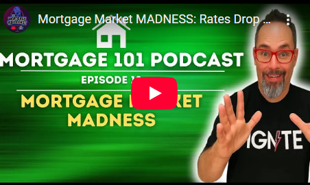 A man is standing in front of a green screen that says mortgage 101 podcast