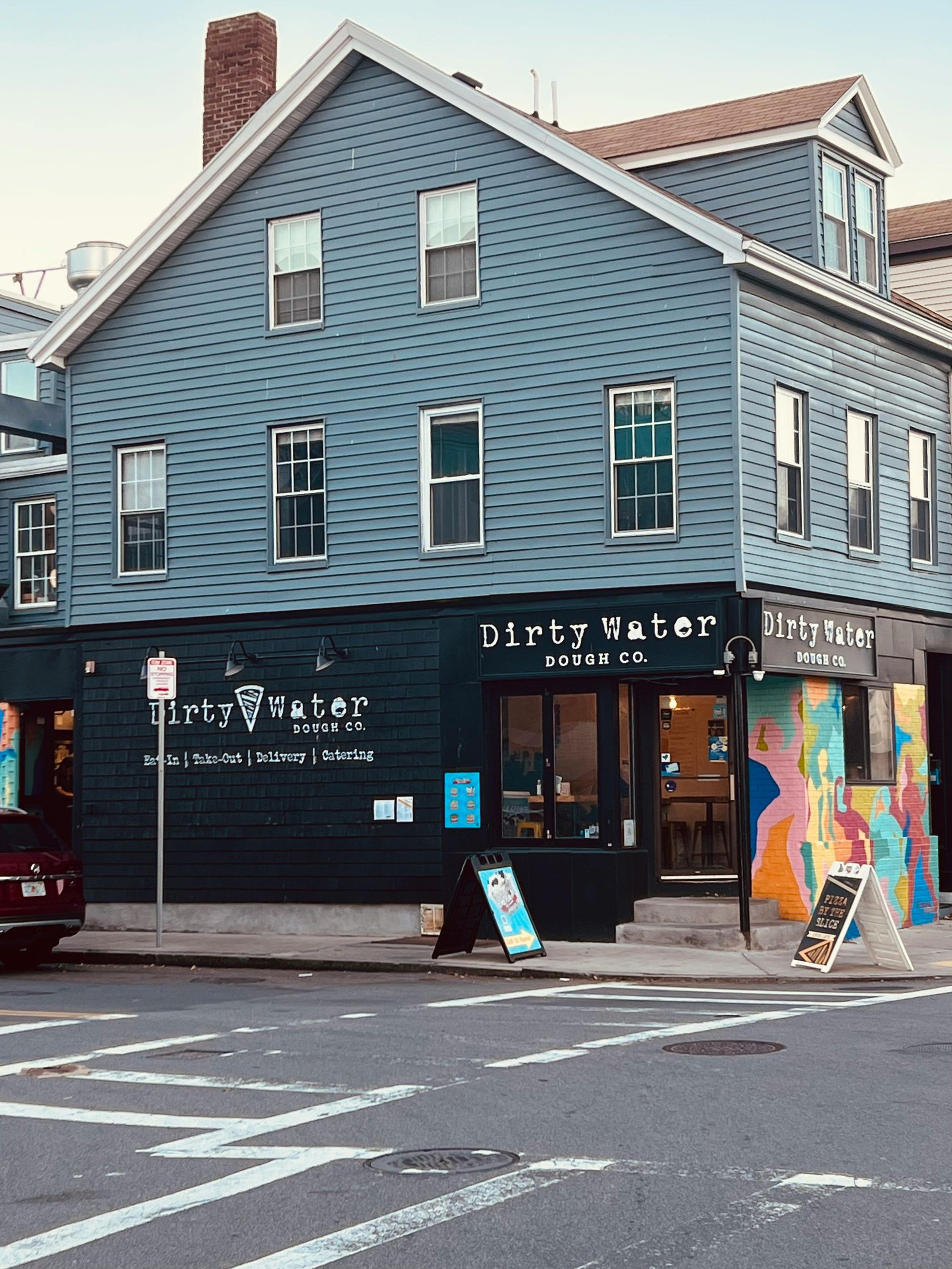 Blue-painted two-story building with