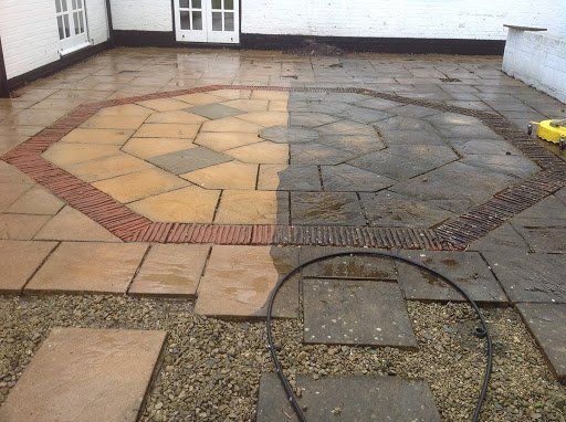 a concrete patio after being jet washed