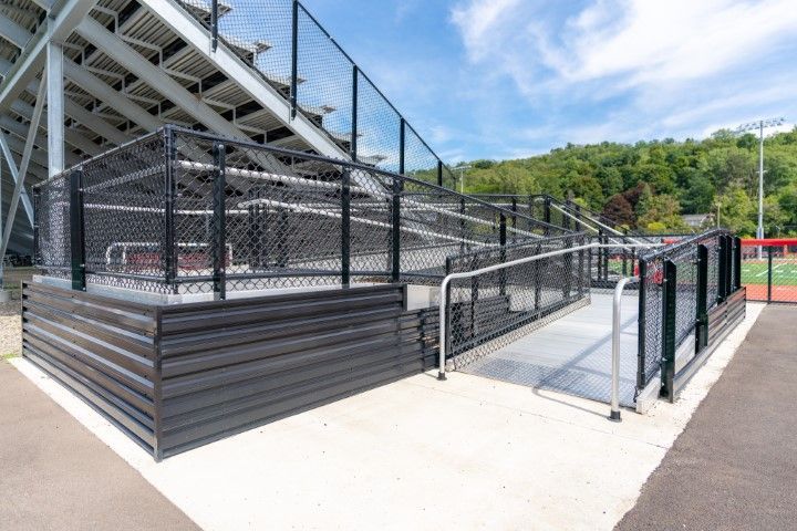 Bleachers with a safe, slip-resistant ramp and handrails