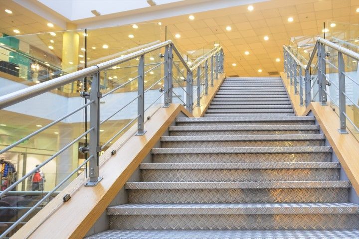 Steel staircase with metal railings in a modern Derby, KS mall