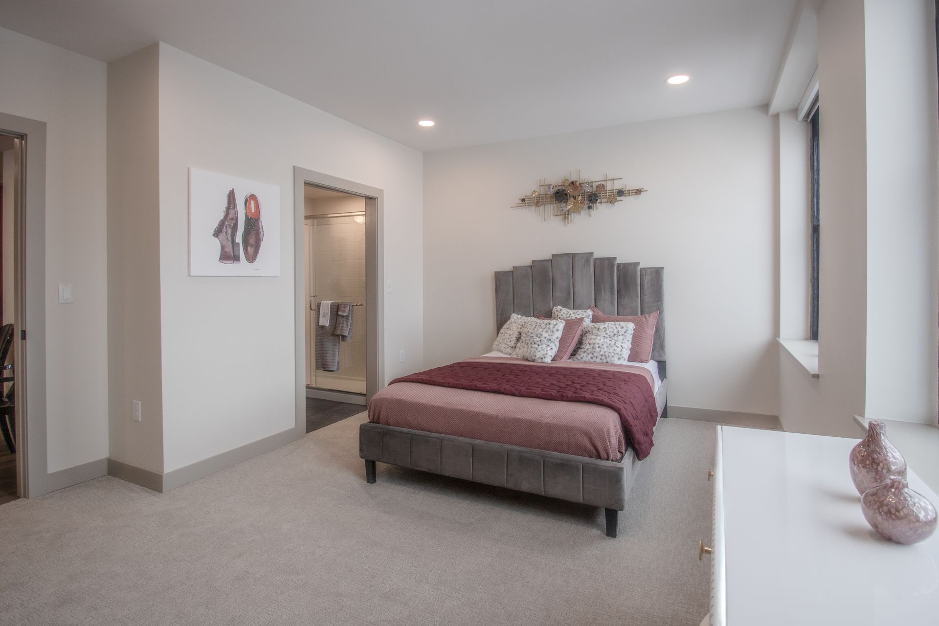 There is a large bed in the middle of the room.