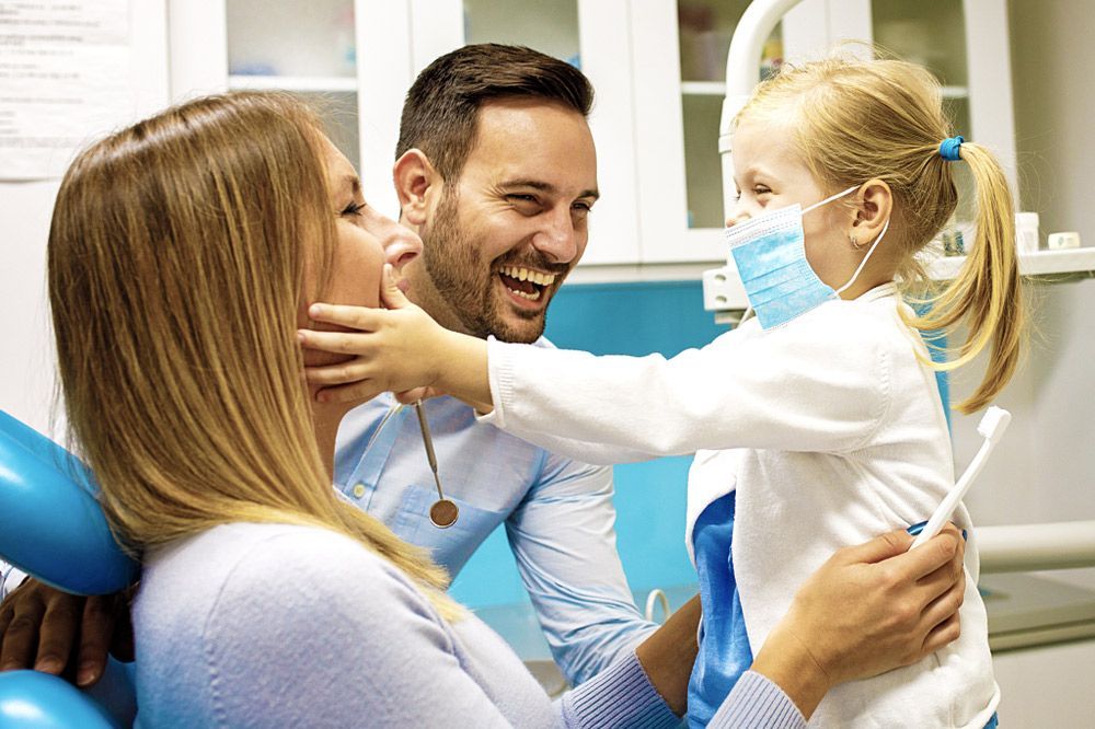 Happy Family is Having Fun in Dental Office — Dental Clinic in Buderim, QLD