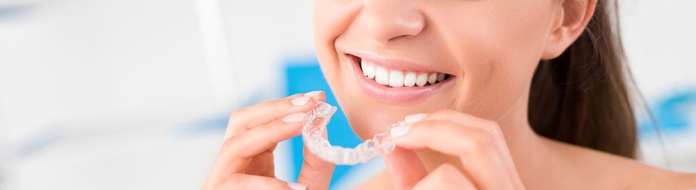 Woman Wearing Orthodontic Silicone Trainer — Dental Clinic in Buderim, QLD