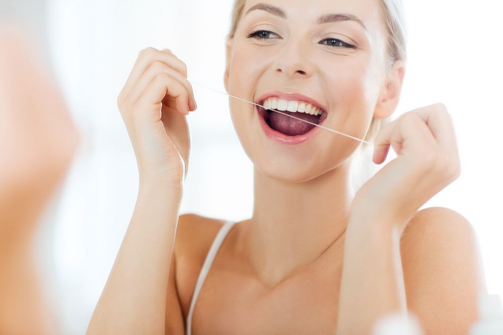 Beautiful Woman Having Tooth Examination — Dental Clinic in Buderim, QLD