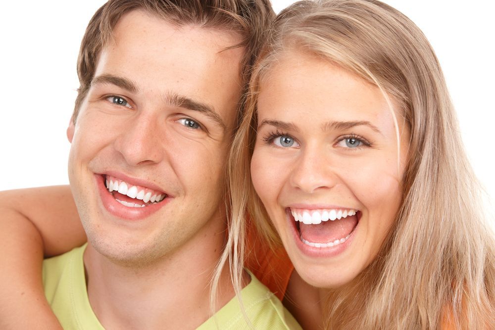 Dentist with Mouth Mirror — Dental Clinic in Buderim, QLD