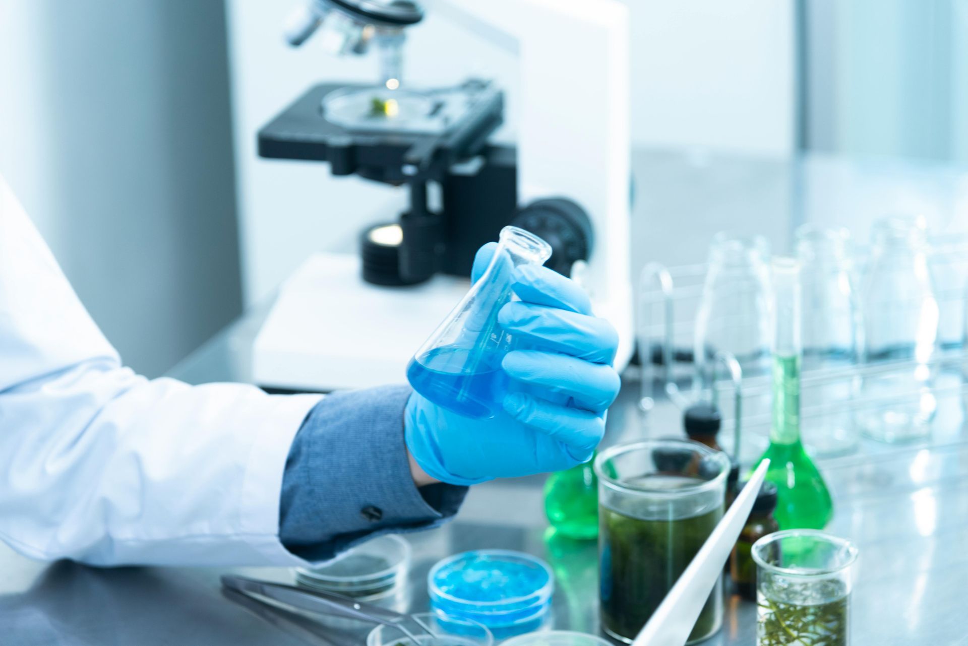 A scientist is holding a beaker of liquid in a laboratory.
PFAS effects on gut health
