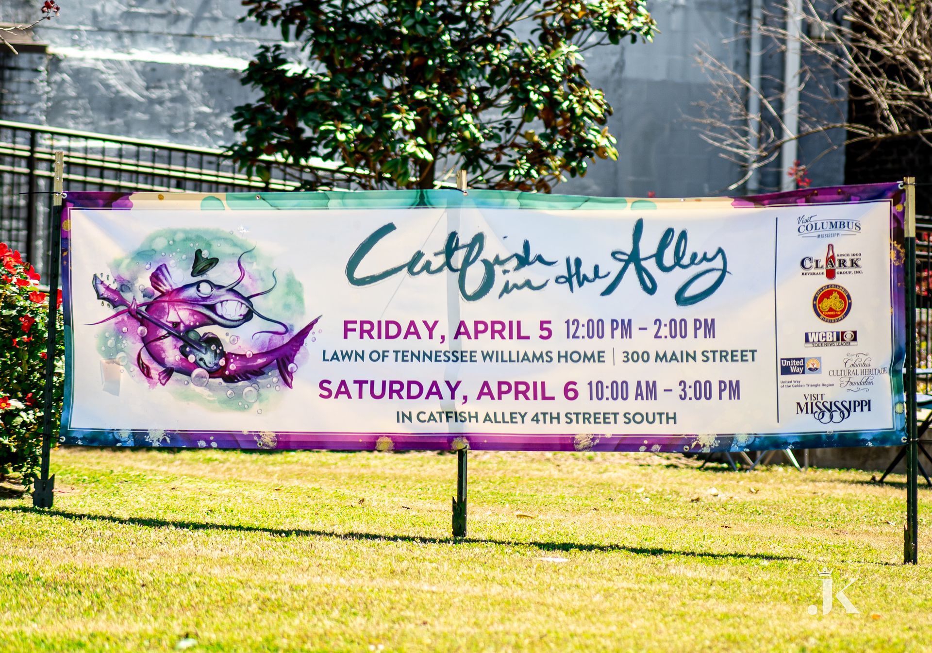 A billboard advertising a crab fest in the alley