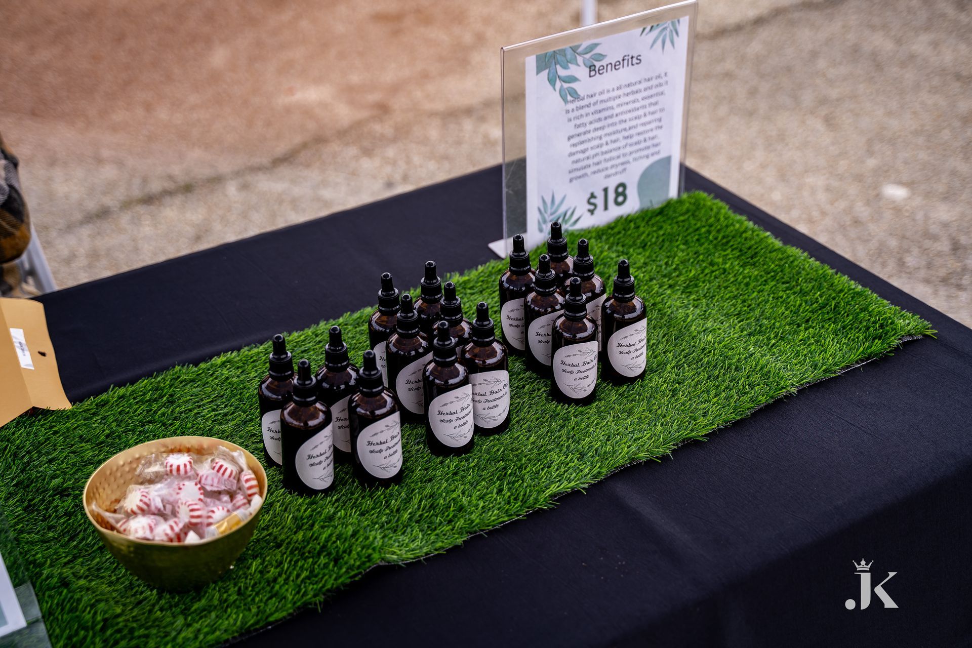 A table with bottles of essential oils on it.