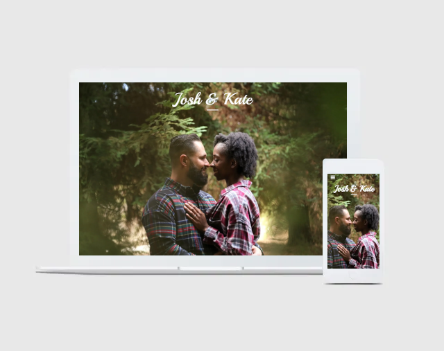 A laptop and a cell phone with a picture of two men kissing on the screen.