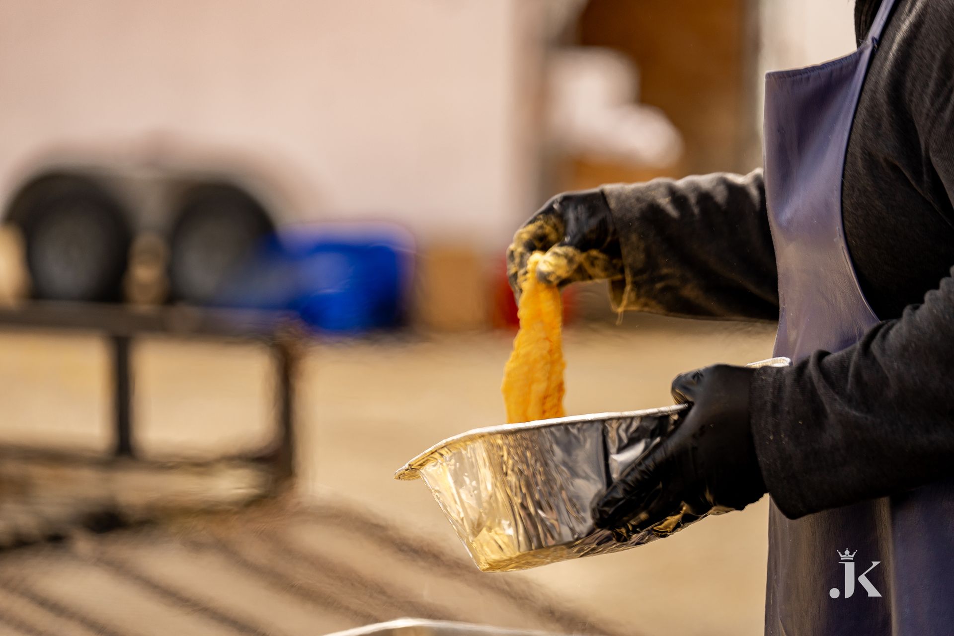 A person is holding a bowl of food in their hands.