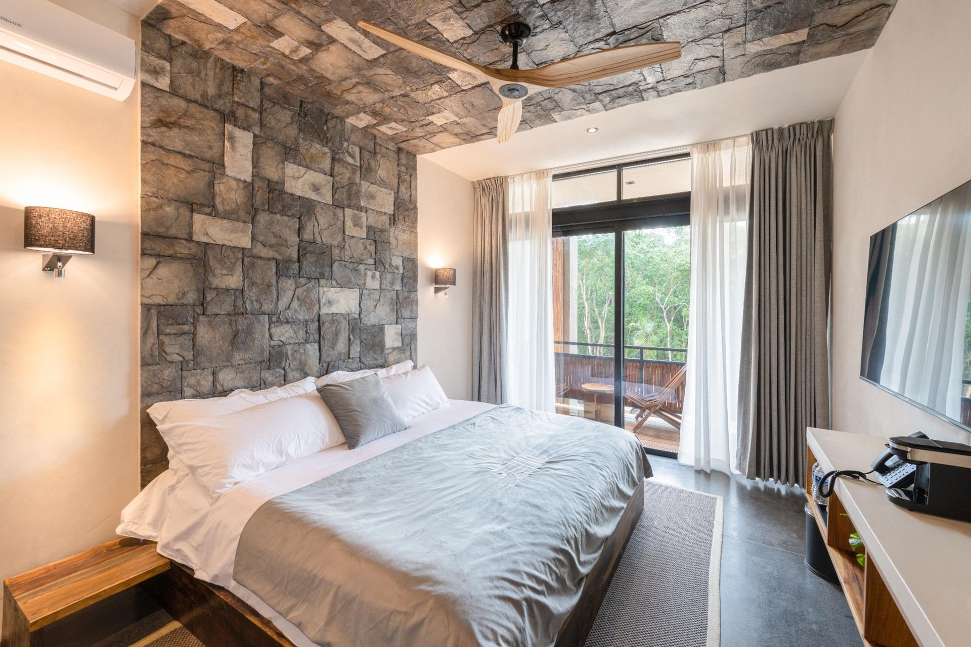 Luxury hotel room in Tulum with natural design