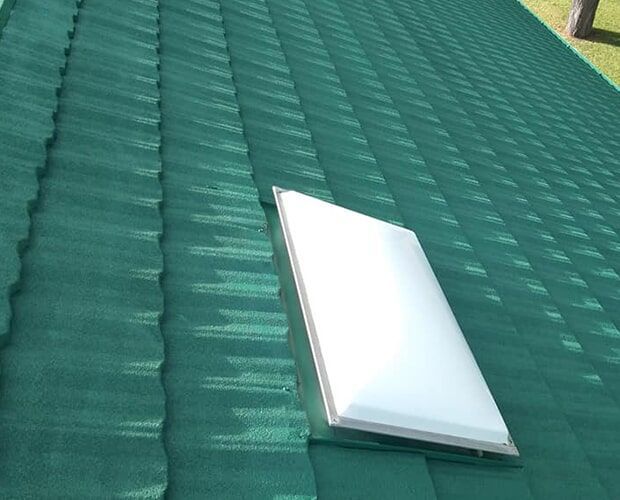 Green Painted Roof — Roof Restoration in Dundowran, QLD