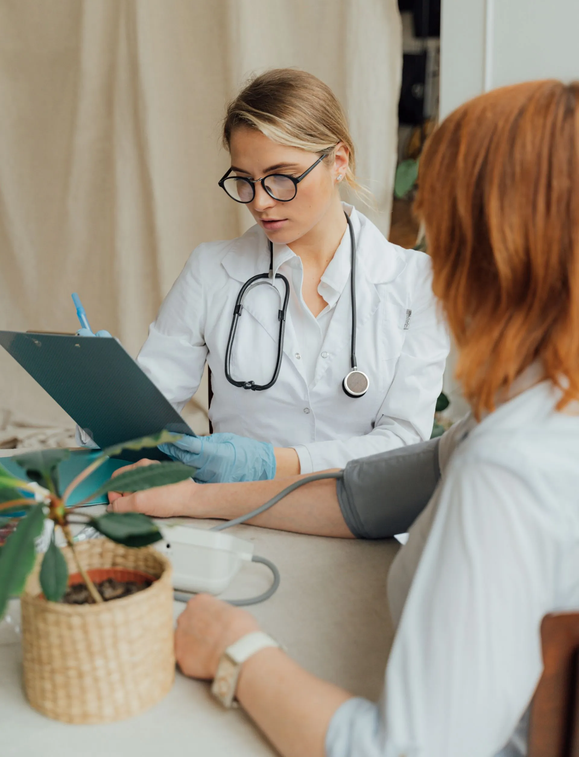 Doctor is reviewing a chart with a patient
