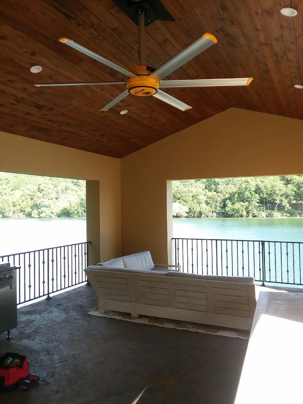 Patio ceiling fan installation Lake Travis, outdoor living space wiring with weather-rated fixtures in Austin