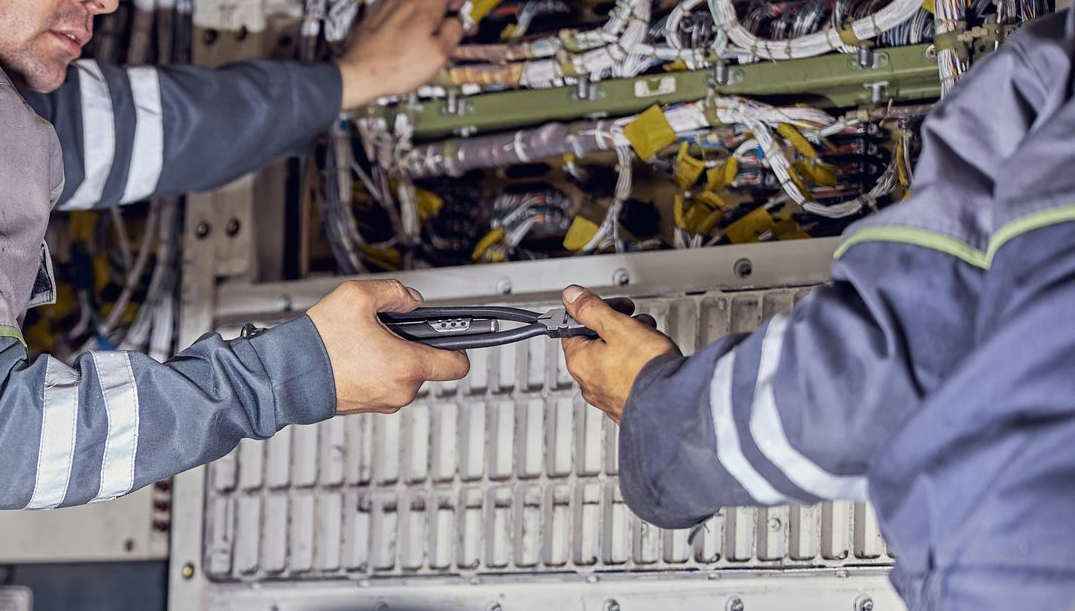 Electrical wiring Austin, technicians installing wiring harnesses