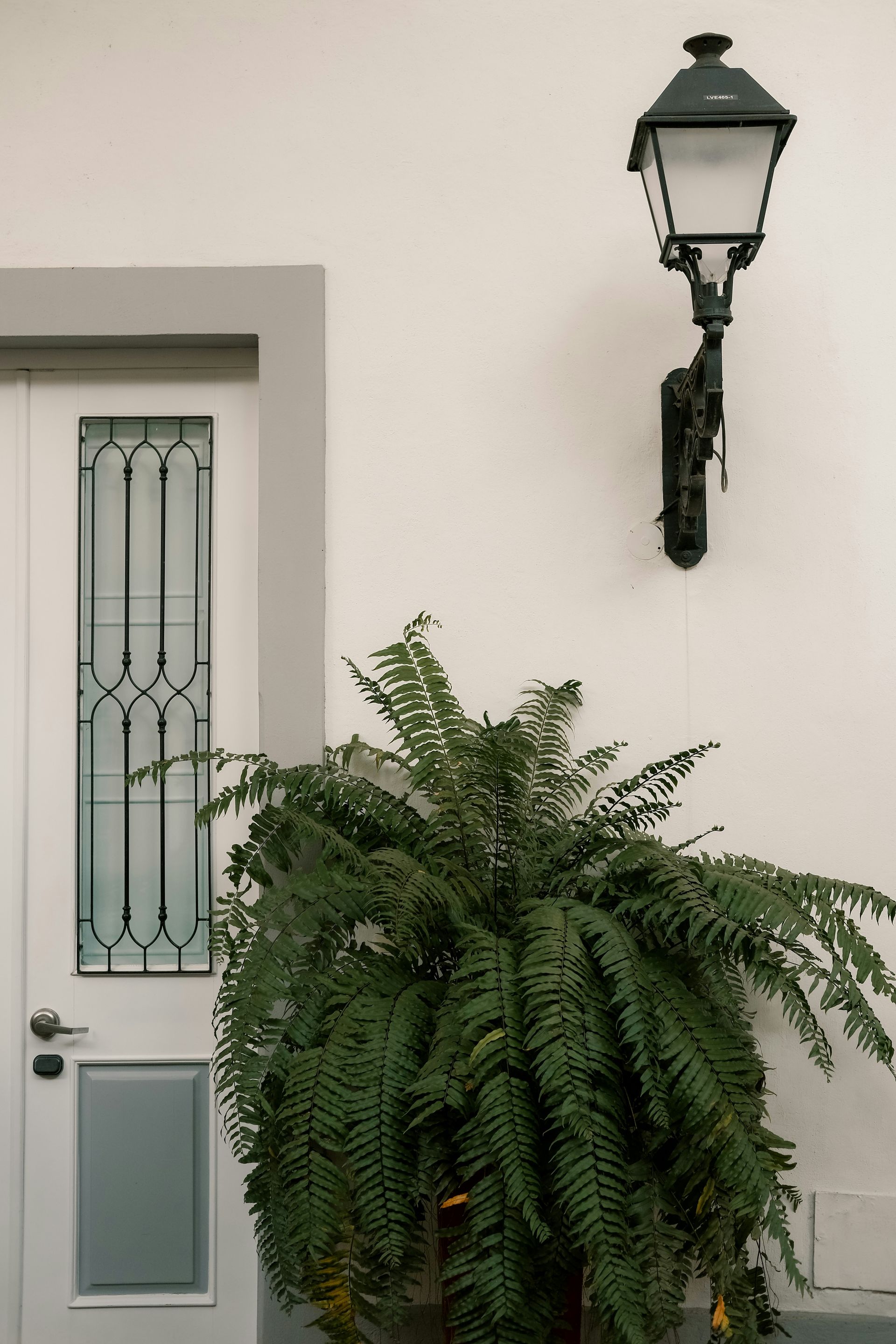 Front porch lighting installation Austin, decorative lantern wiring with GFCI-protected exterior circuit