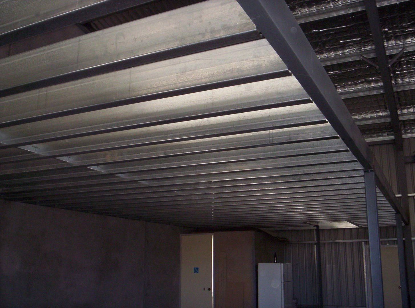 A Room with A Metal Ceiling and A White Cabinet — Magnum Steel In Crestwood, NSW