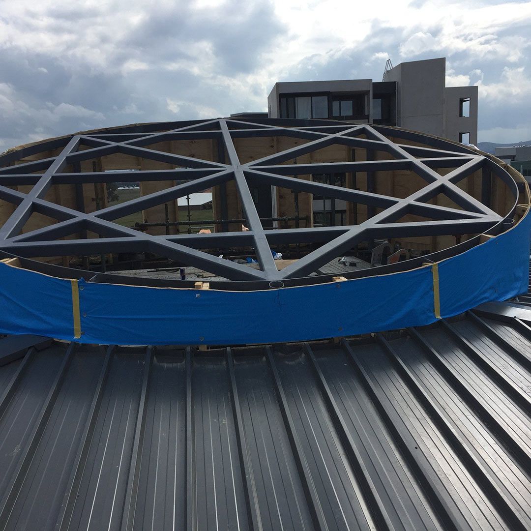 A Circular Structure with A Blue Tarp on Top of It — Magnum Steel In Crestwood, NSW