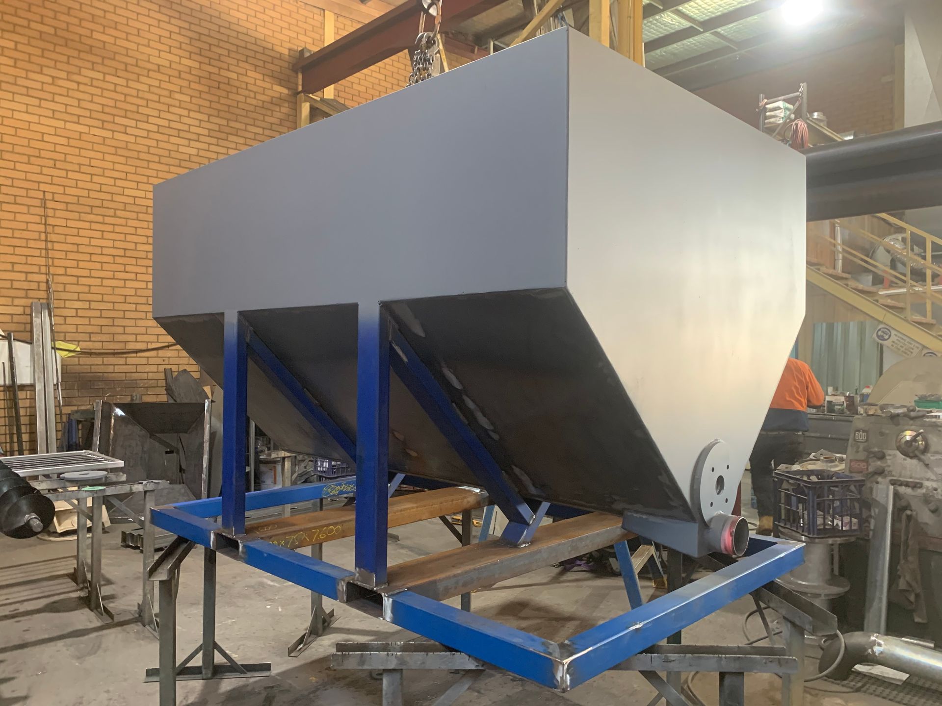 A large metal container is being built in a factory — Magnum Steel In Crestwood, NSW