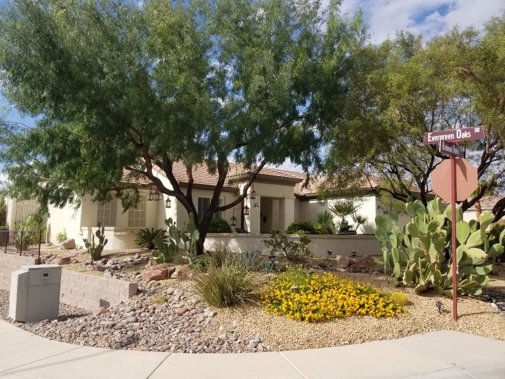 A house with a street sign that says evergreen drive