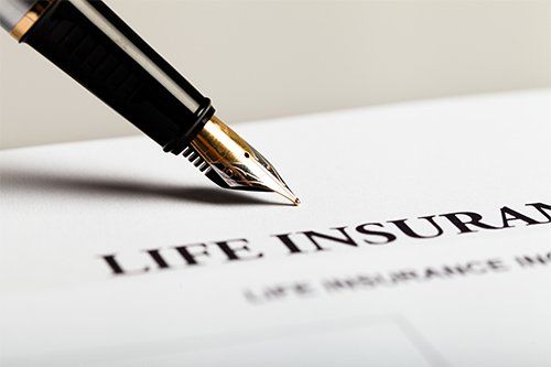 Life Insurance Form And Pen